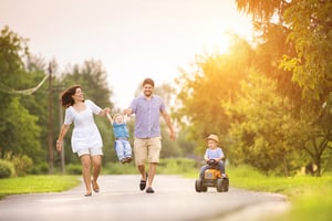 family playing in rural area
